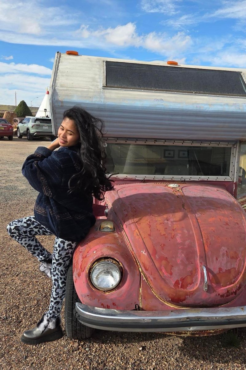Woman with VW Bug